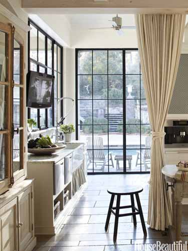 3 Quick Home Decorating Ideas: Transform your kitchen with white curtains and a table and chairs.