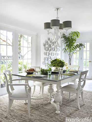 Quick home decorating ideas for a white dining room with a white table and chairs.