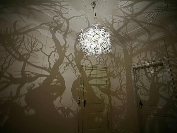 Strange chandelier producing scary shadows
