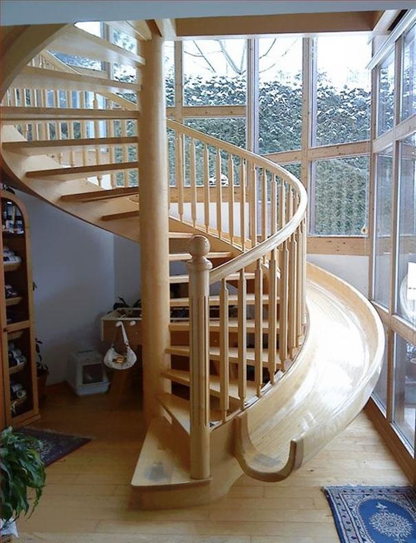 Wooden slide next to your rounded staircase