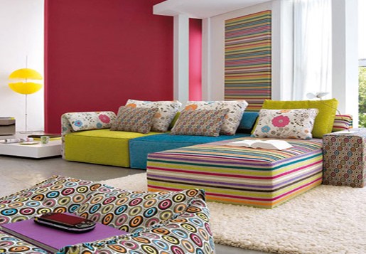 A colorful living room with striped furniture perfect for celebrating the New Year.
