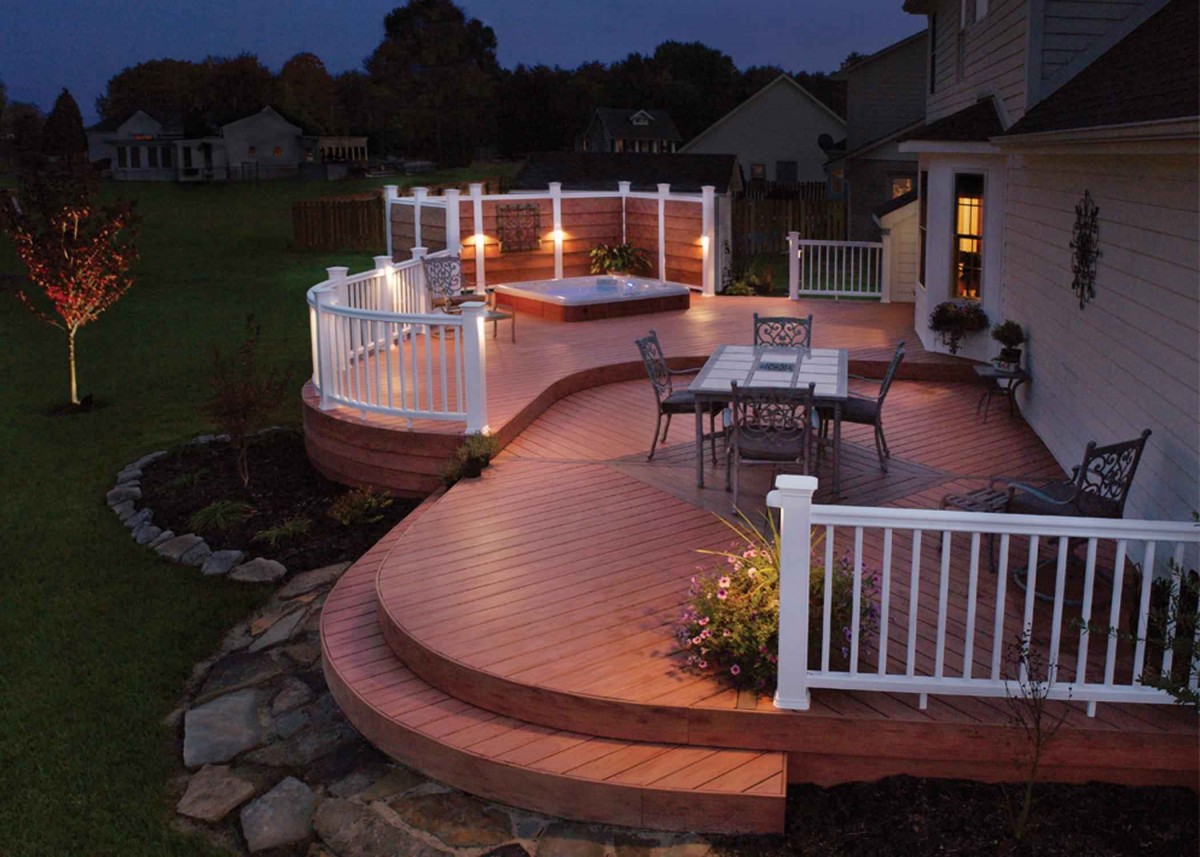 A wooden deck with a fire pit at night undergoes six facelifts.