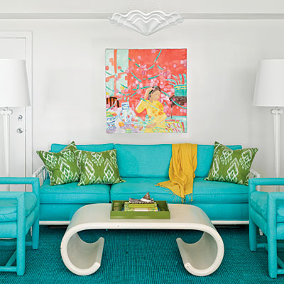 Brightening a living room with a turquoise couch.