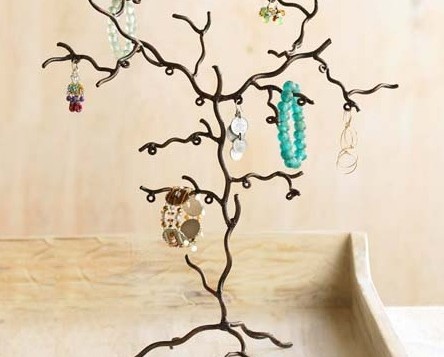 A metallic tree adorned with stunning jewelry, perfect for the New Year celebration.