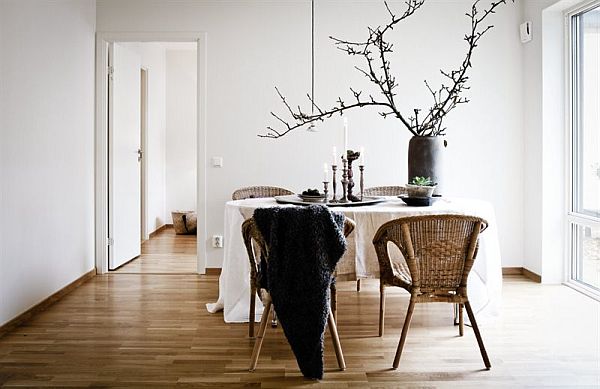 A winter-themed dining room with a white table and chairs.