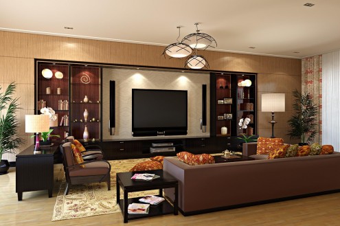 A living room with brown furniture and an entertainment center.