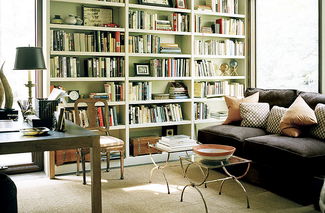 A living room with bookshelves.