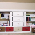 A white bookcase with drawers and hidden storage area