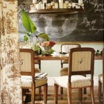 A dining room with a chalkboard.