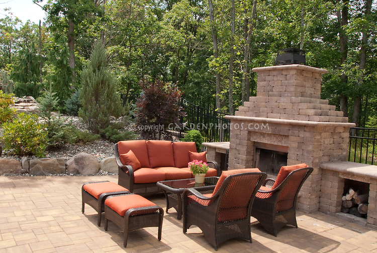 Outdoor patio with fireplace.