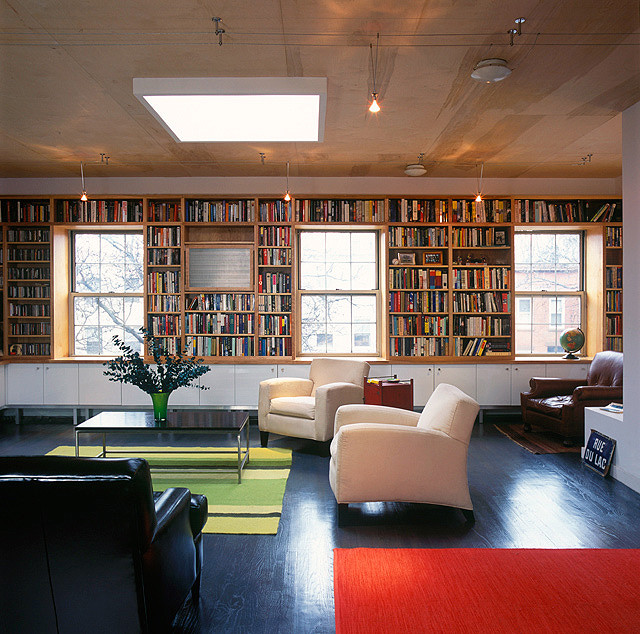 A living room with built-in bookshelves.