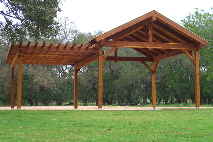 A backyard pavilion made of wood.