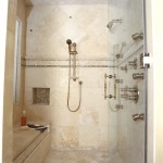 A unique shower with a bench and shower head.