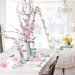 A festive dining room with pink flowers.