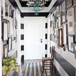 Entryway with black and white striped walls.
