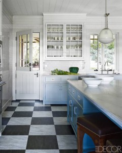 A blue and white room with a checkered floor.