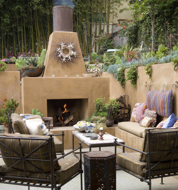 An outdoor patio with a fire pit.