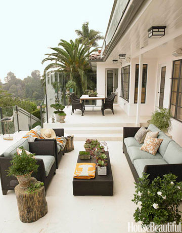 Outdoor patio with wicker furniture.