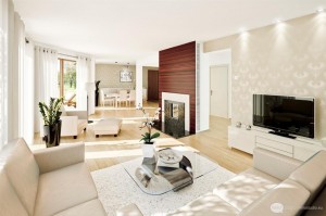 A small living room with beige walls and white furniture.