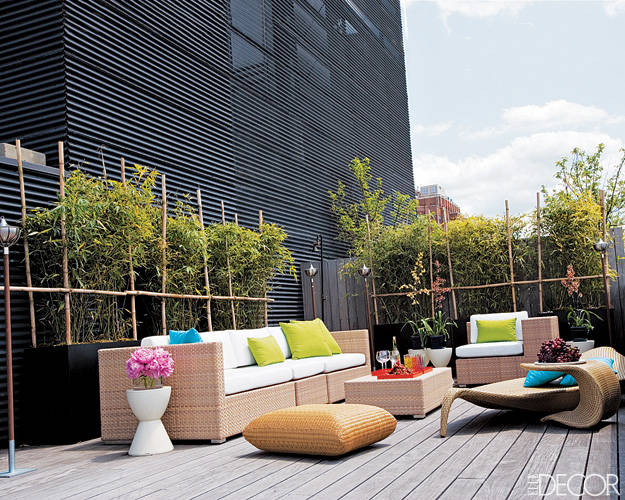 A wicker-furnished terrace deck.