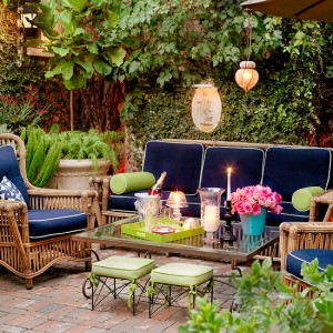 Outdoor living with wicker furniture on a patio.