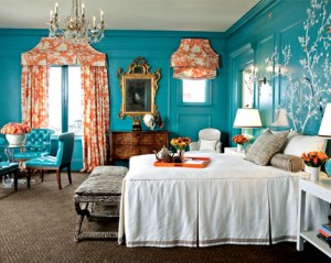 A bedroom with vibrant color combinations.