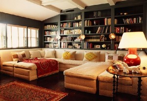 An expanse of bookshelves enhance this living area