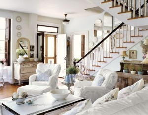 A living room showcasing white furniture for elegant decorating.