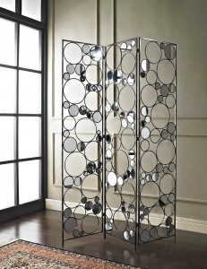 A folding screens room divider with circular mirrors.