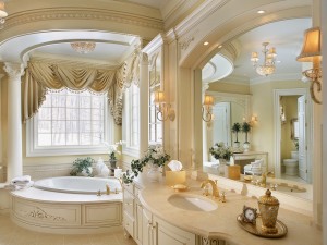 A large bathroom with a large tub and sink, decorated with white.