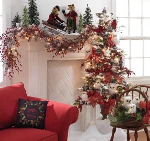 A holiday-themed living room with a Christmas tree decorated with birds.