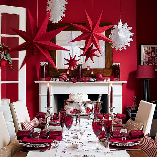 Festive dining room adorned with red and white Christmas decorations.