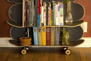 A creative bookcase made out of skateboards.
