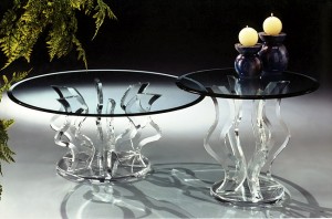 A versatile glass table featuring a candle.