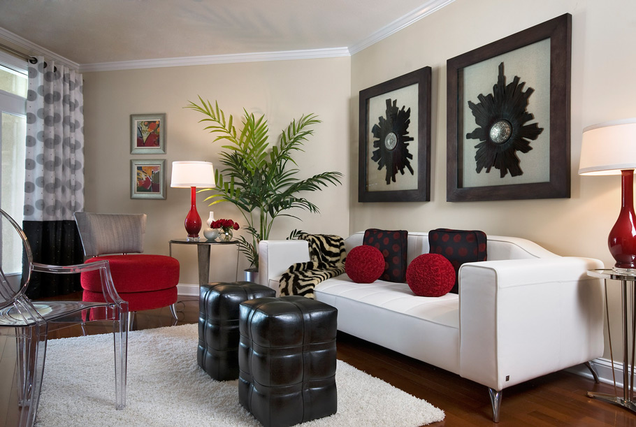 A living room with bold and classic red furniture.