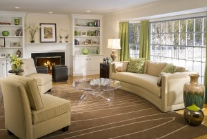 A living room with durable green furniture.