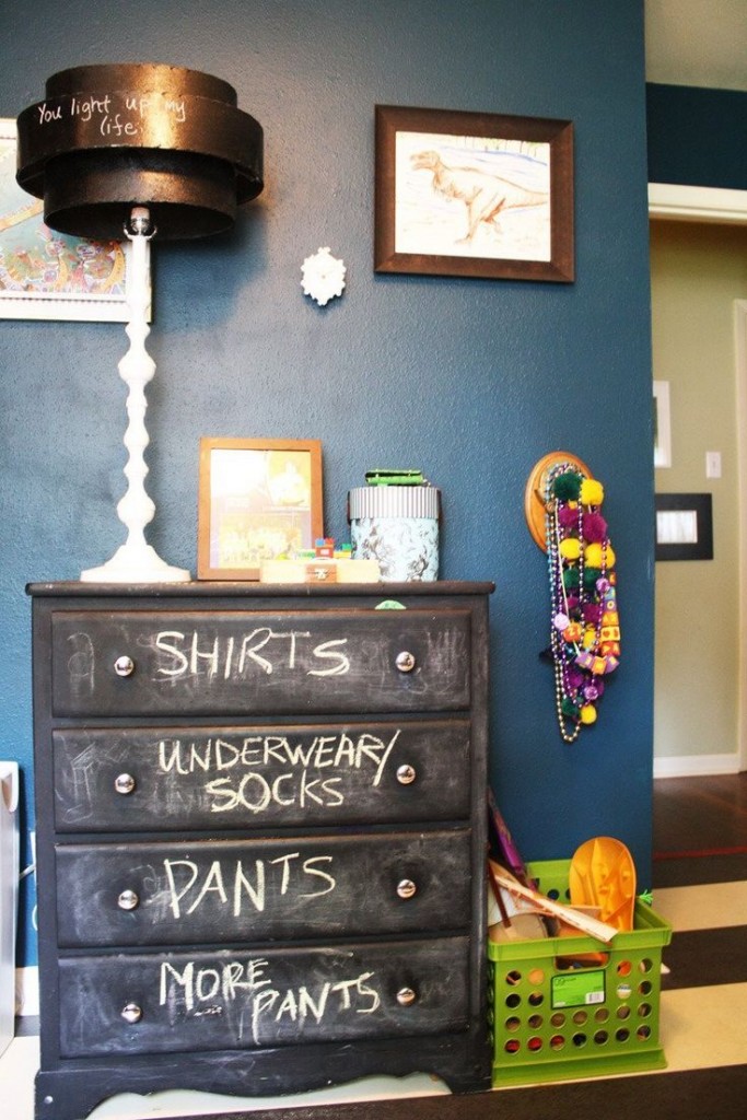 A chalkboard dresser in a child's room, offering creative chalkboard paint ideas for your home.