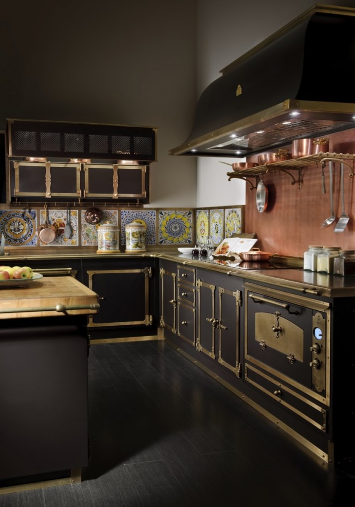A steampunk kitchen with black and gold decor and tiled floors.