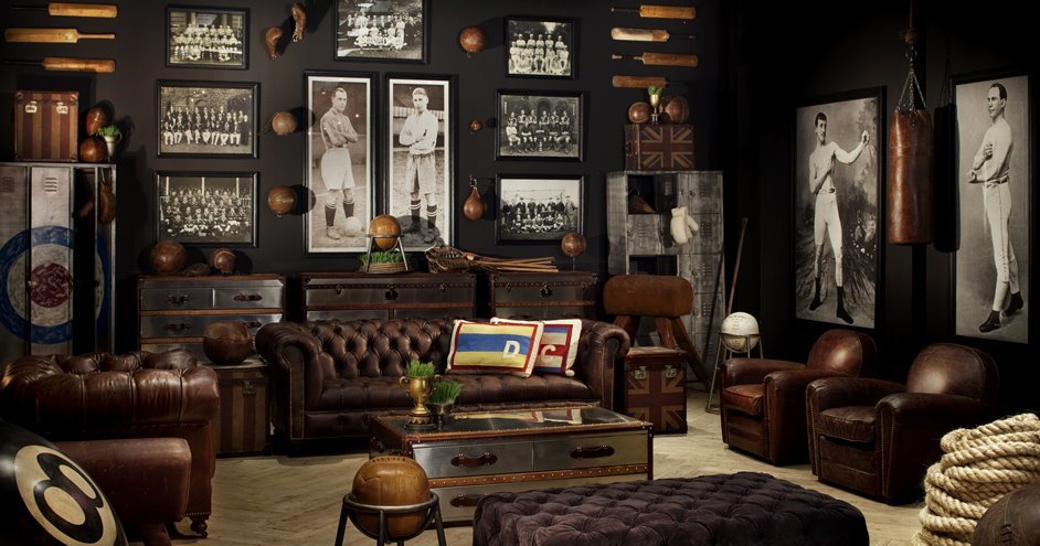 A room filled with steampunk-themed leather furniture and baseball memorabilia.