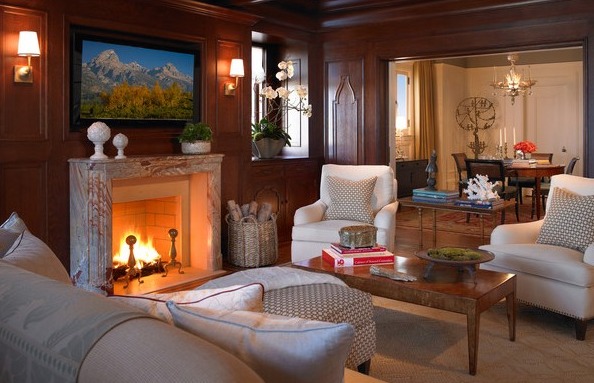 Creating a Cozy Living Space with Wood Paneling and a Fireplace.