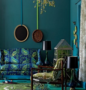 A living room with a bold blue and green color scheme in 2015.