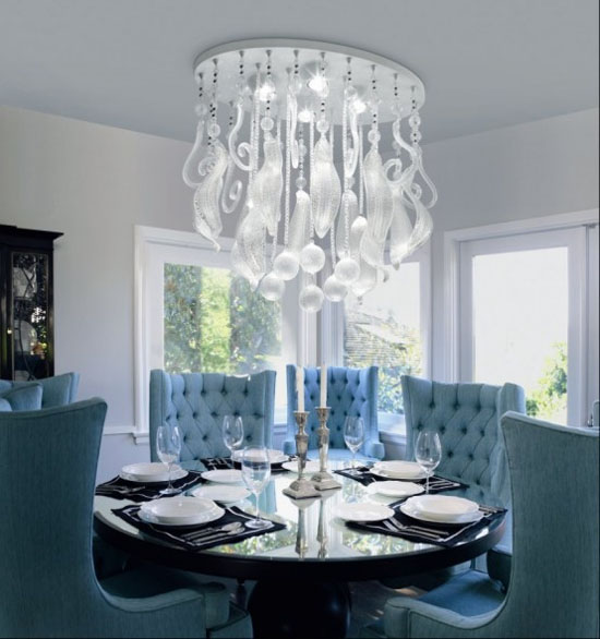 A dining room with a crystal chandelier.