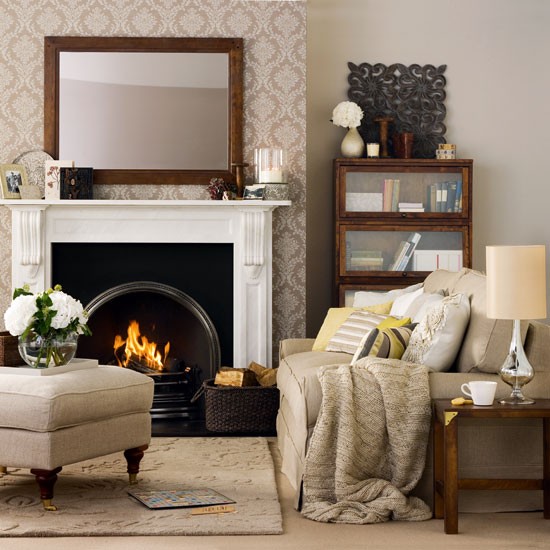 Creating a cozy living space with a fireplace and beige furniture.
