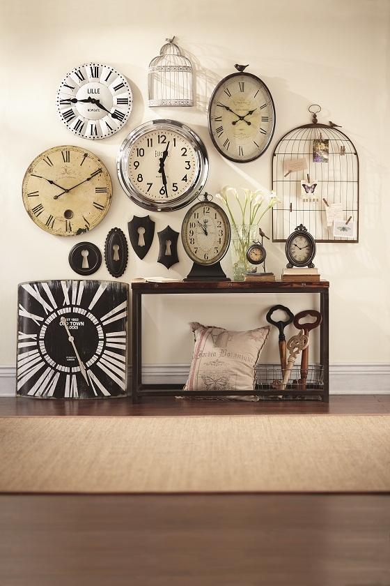 A wall filled with clocks.