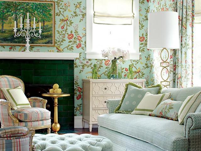 A living room with green and blue florals.