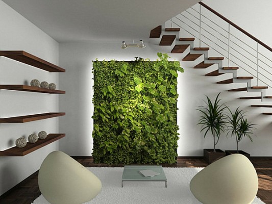 A living room with unexpected green wall feature.