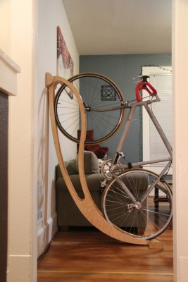 A bike rack for bicycle storage in a living room.
