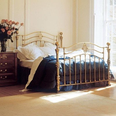 A spring bed in a bedroom.