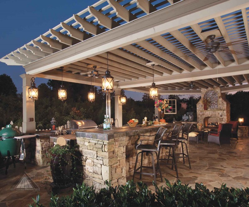 An outdoor kitchen with a grill.