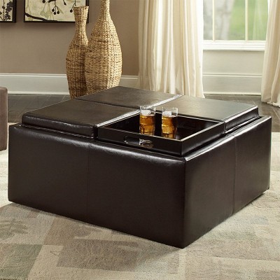 A coffee table with a built-in tray for drinks, serving as a versatile alternative to traditional coffee tables.